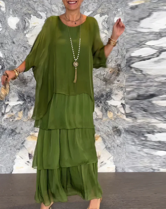 Chic women's two-piece boho maxi dress set, a flowy layered outfit with batwing top for effortless summer style.