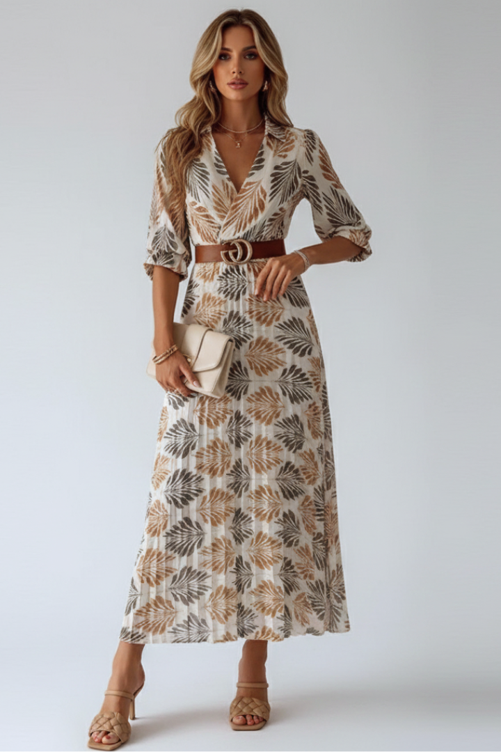 Elegant women's patterned maxi dress with elbow sleeves, ideal for versatile spring fashion & comfortable summer style.