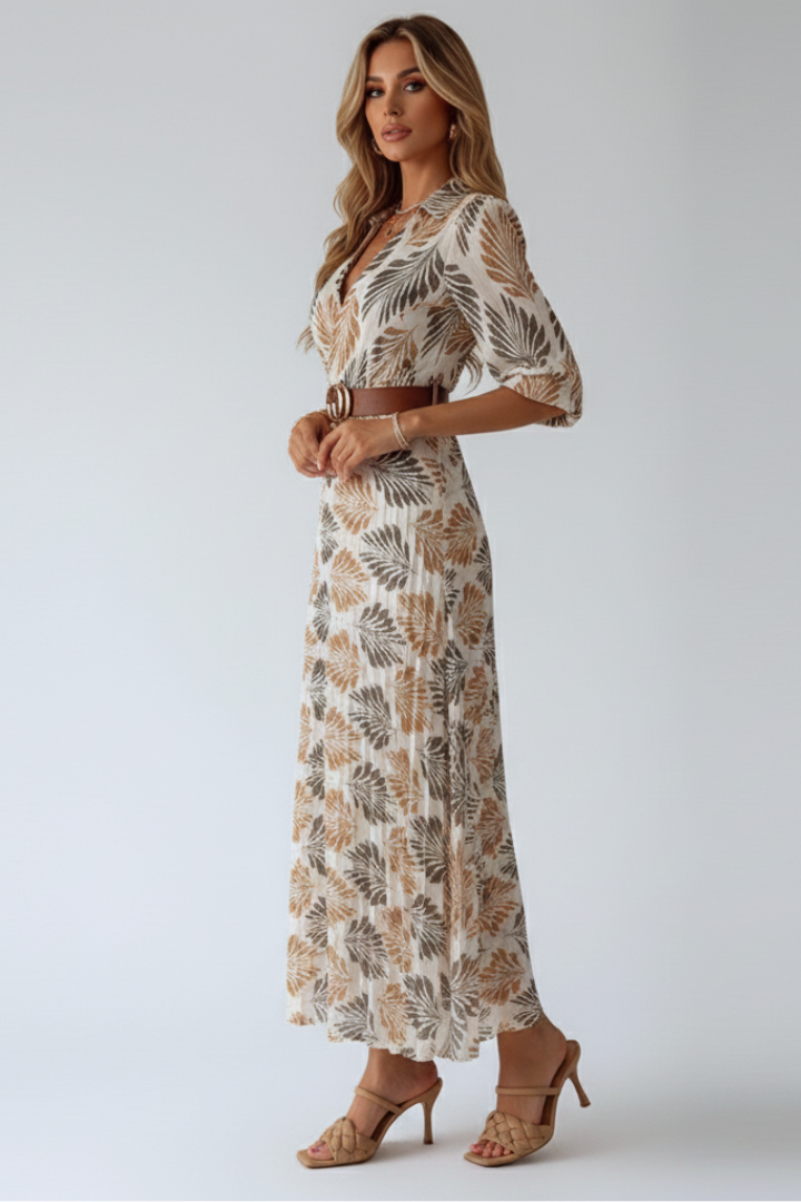 Comfortable women's patterned maxi dress with elbow sleeves, a flowy design for breezy spring and summer fashion.