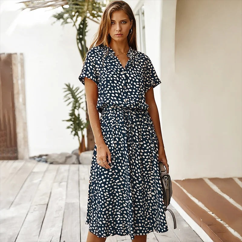 Stylish women's printed midi dress, a flowy summer sundress perfect for casual and elegant warm weather fashion.