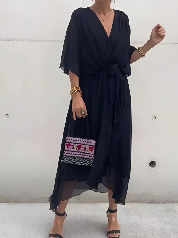 Stylish women's V-neck flowy maxi dress, belted for a chic summer fashion look.