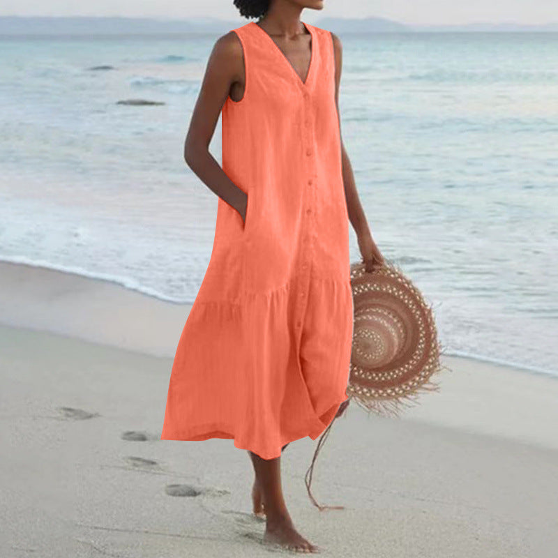 Comfortable women's tiered V-neck midi dress for summer, featuring button front. Casual yet elegant beach wear.