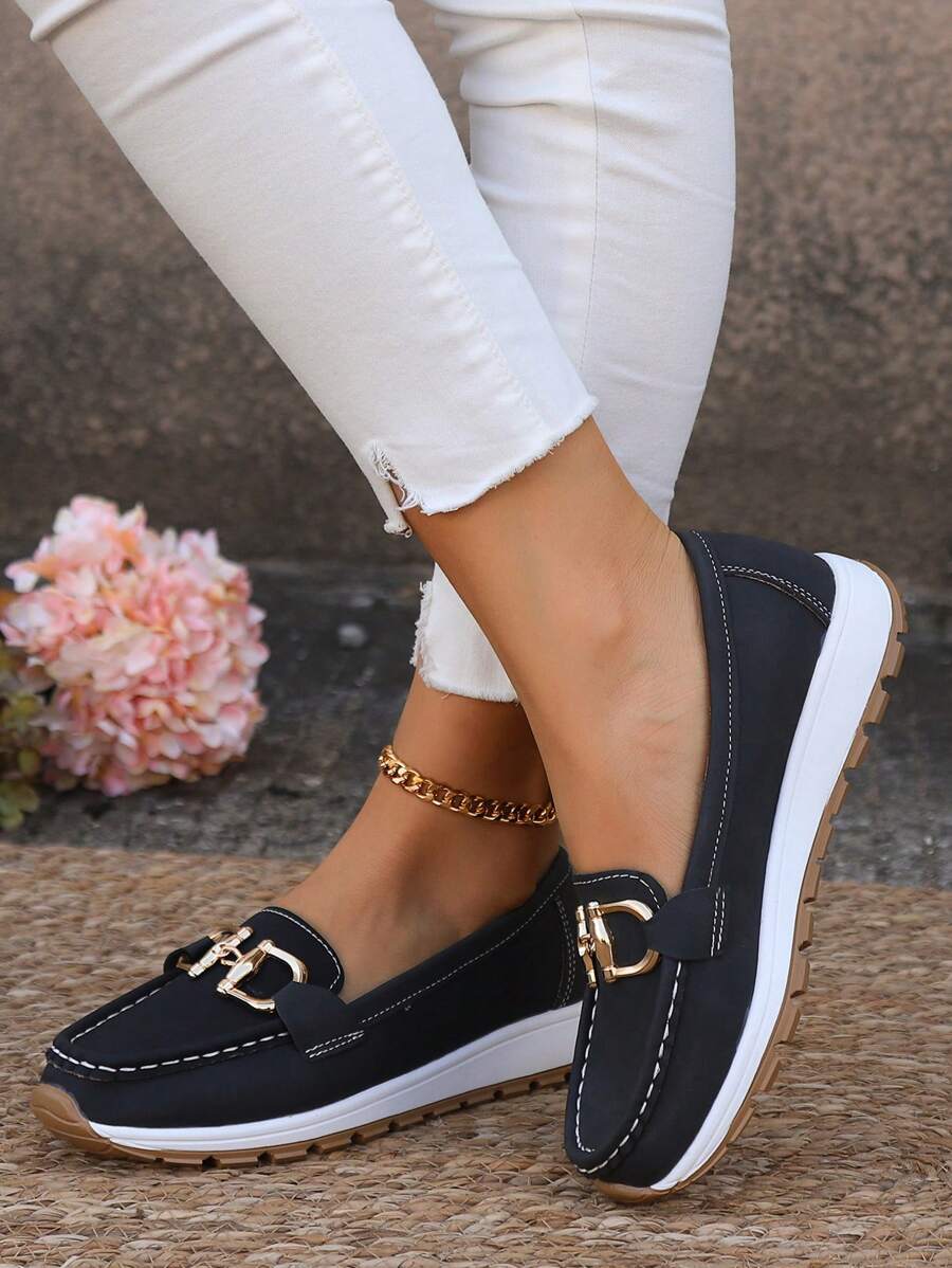 Side view of women's flatform loafers featuring elegant gold chain detail and comfortable sole. Perfect for spring.