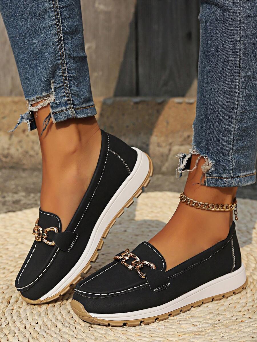 Versatile women's gold-trim horsebit loafers. Classic, comfortable slip-on shoes for elegant everyday wear.