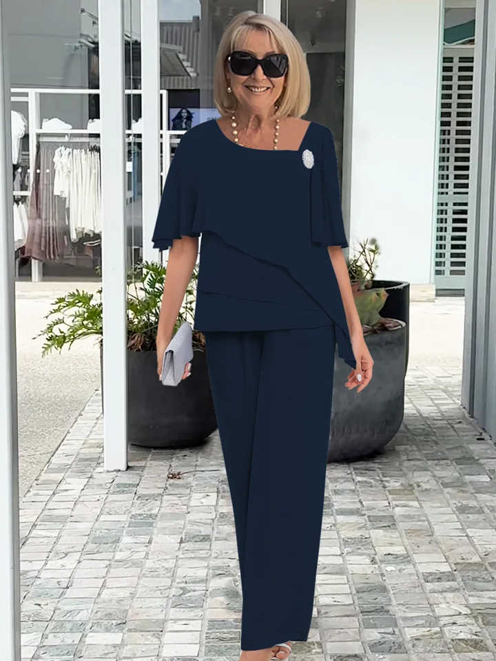 Matching women's overlay top & full-length straight-leg pants set. Versatile & comfortable two-piece outfit.
