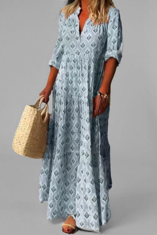 Graceful women's tiered maxi dress, showcasing the beautiful flowy fabric and elegant long silhouette for any event.