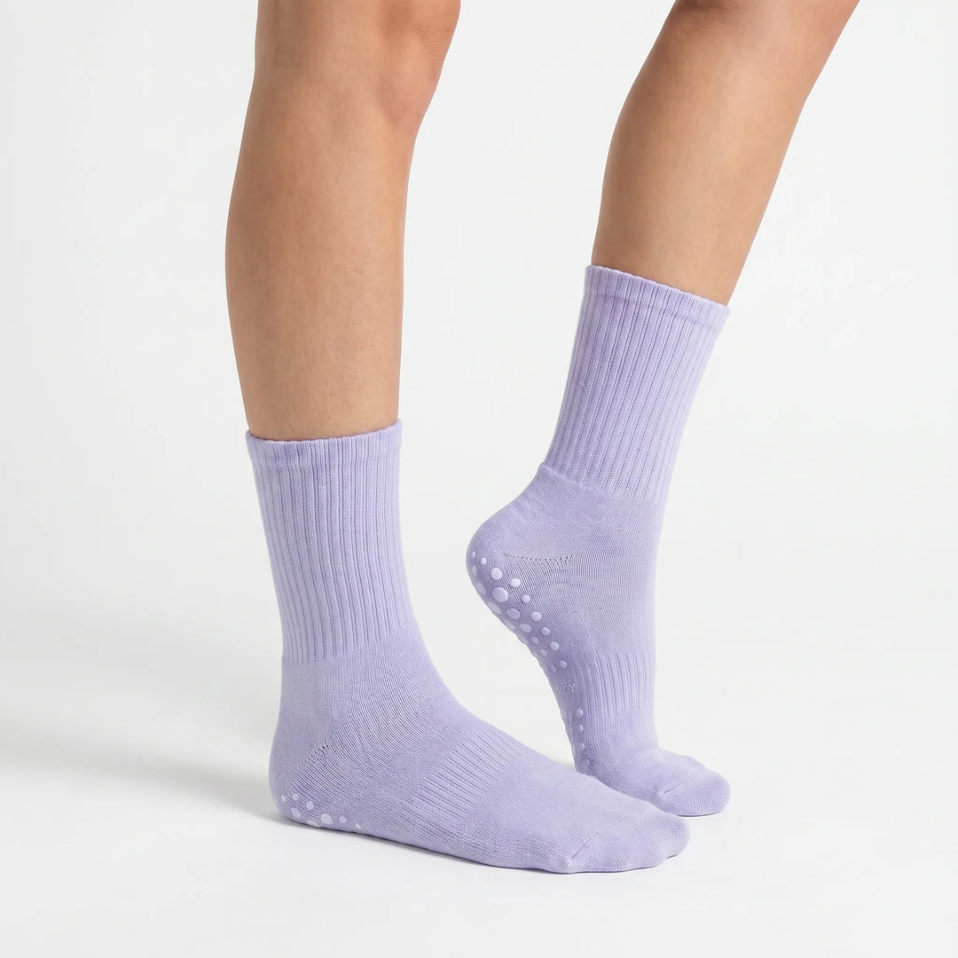 Perform better in studio workouts with women's grippy crew socks. Ideal for yoga, pilates & barre.