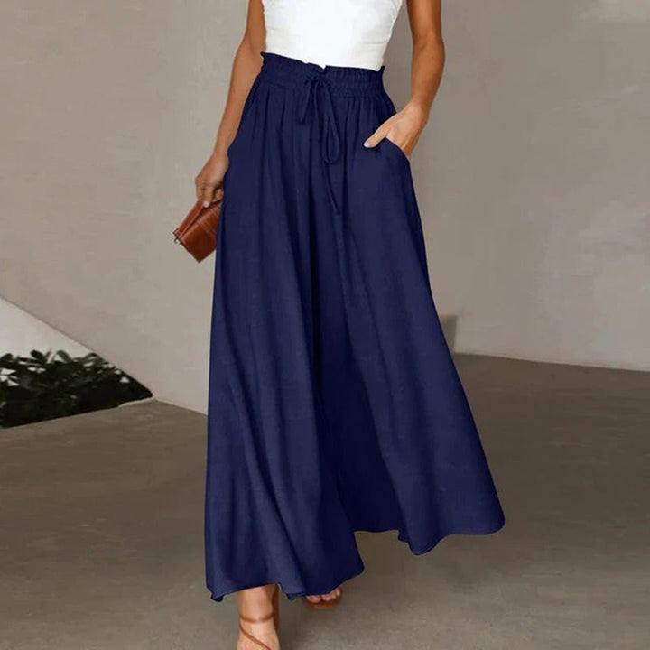 Women's high waist wide leg pants with adjustable drawstring, comfortable fit, and practical pockets for versatile wear.