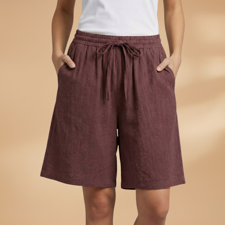 Women's high waist wide leg shorts, a key piece for summer fashion. Features a drawstring.