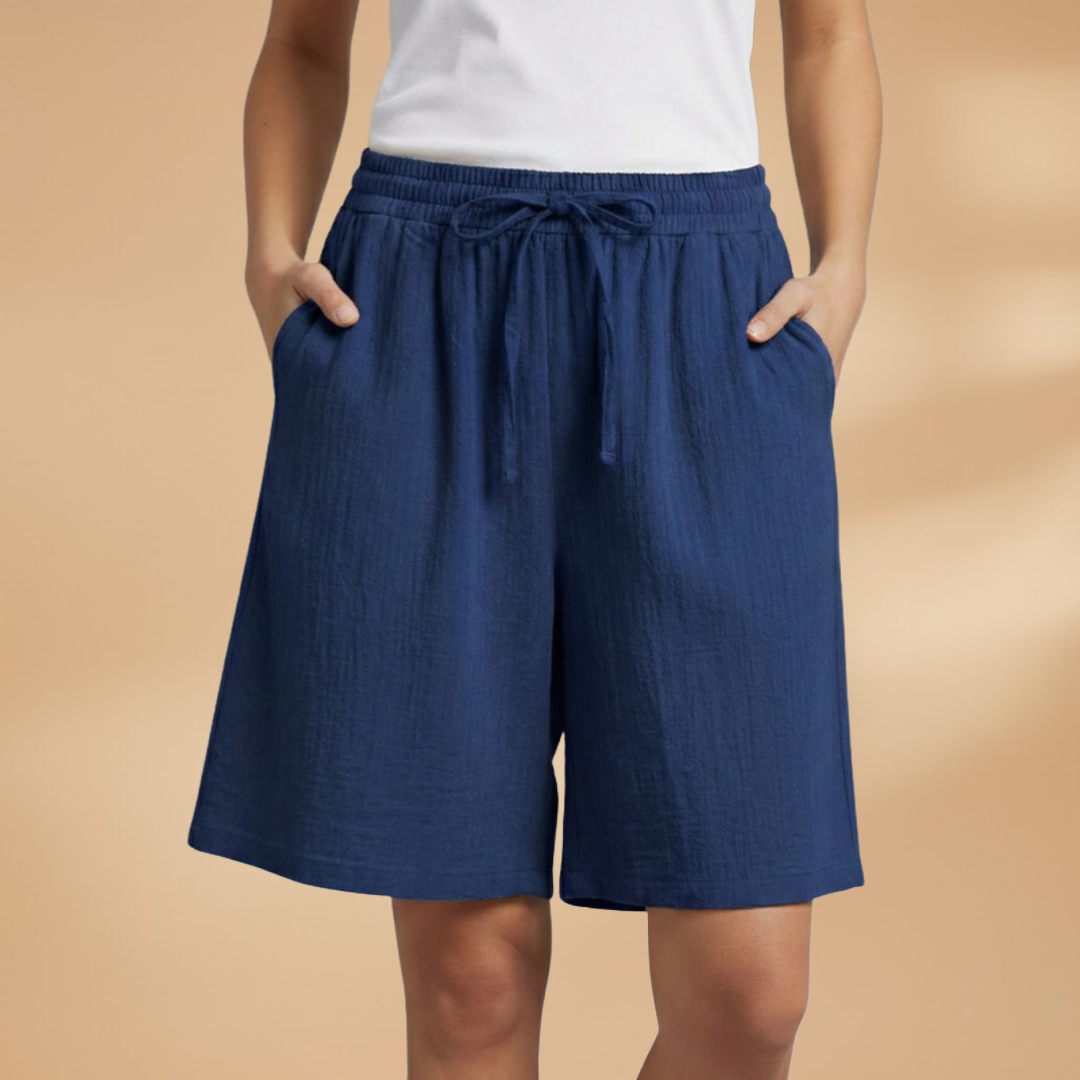 Trendy women's shorts: high waist, wide leg, and a functional drawstring for resort wear.