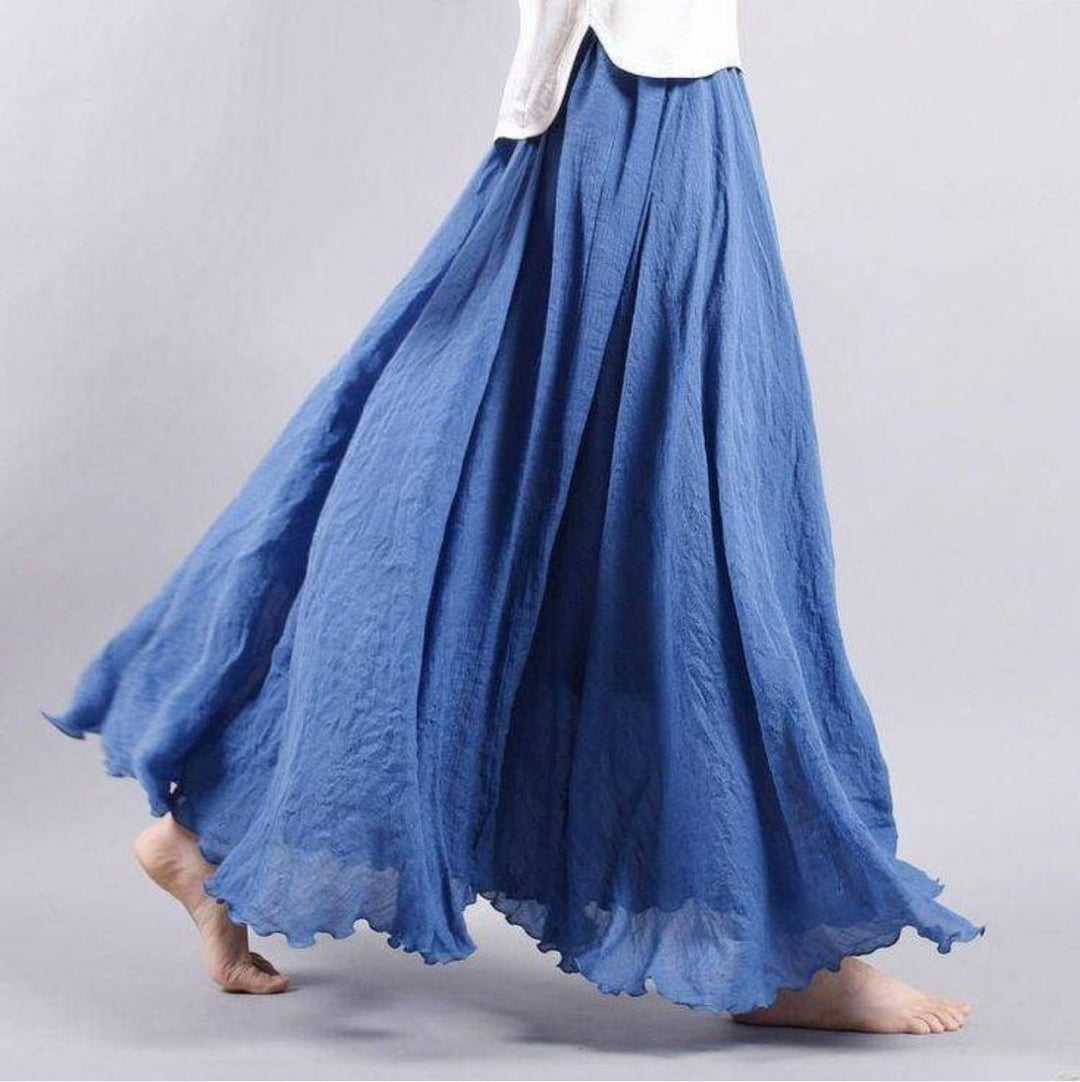 Women's high-waisted A-line maxi skirt with a flowing bohemian design, long, comfortable, and stylish.
