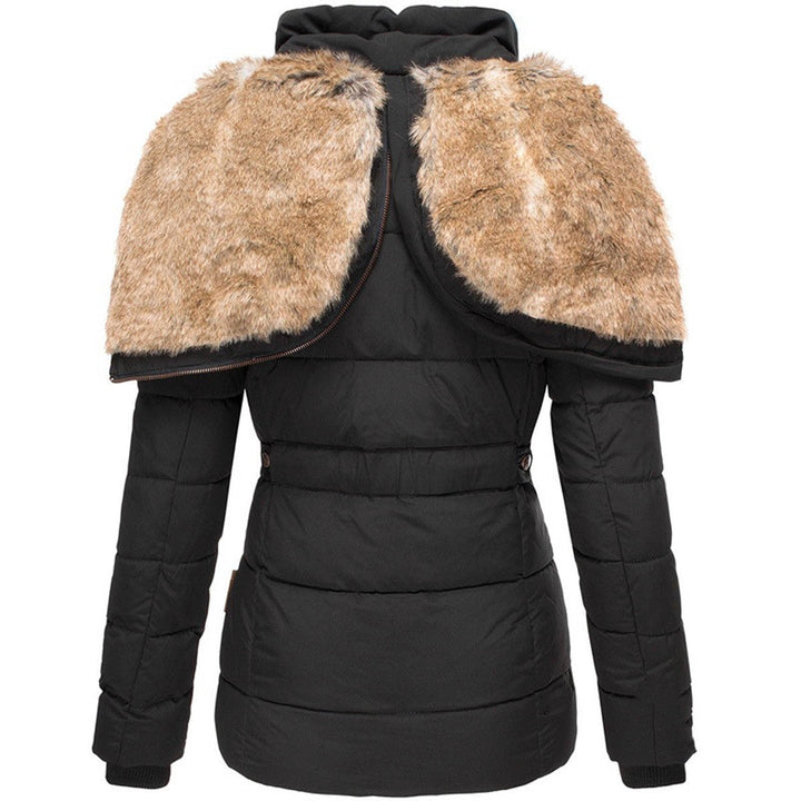 Warm women's insulated coat, puffer style with a cozy hood, essential for winter fashion.