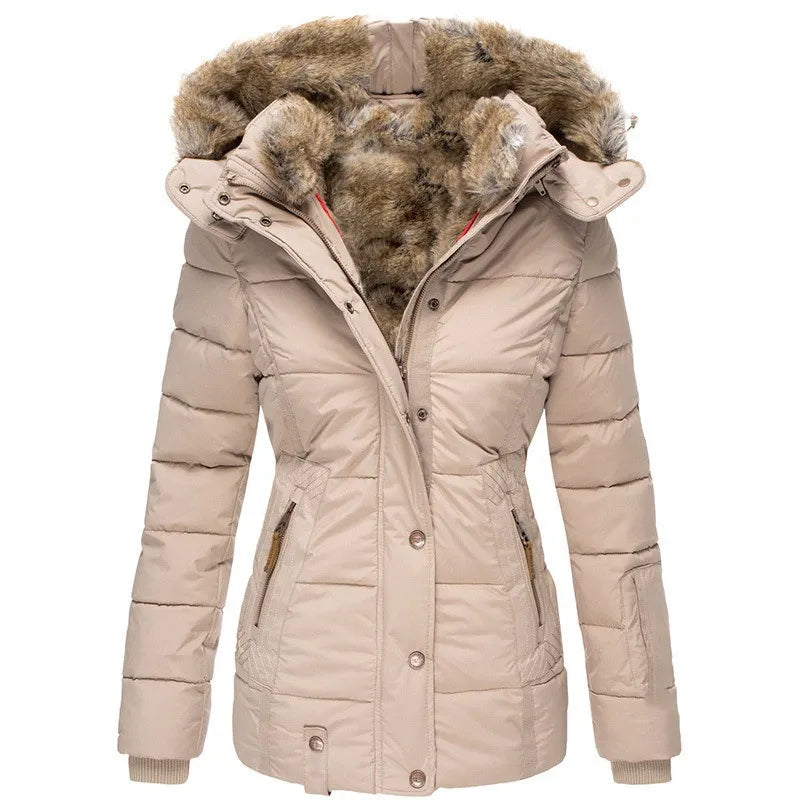 Puffer style women's winter coat, insulated for ultimate warmth, features a versatile hood.