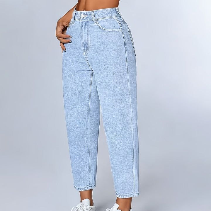 Stylish women's light blue mom jeans, high waist, relaxed fit, tapered leg, perfect for versatile casual outfits.