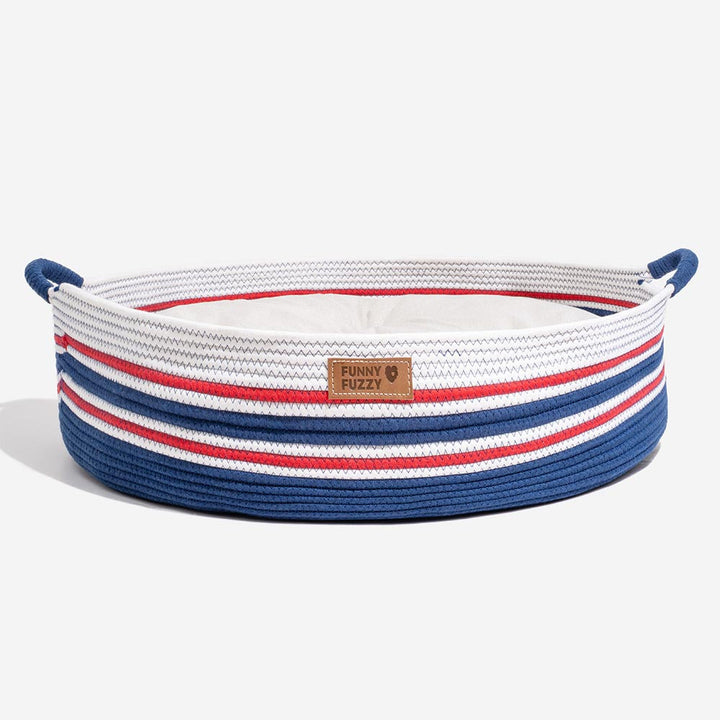 Lightweight cotton woven pet carrier beach bag with sand in the background, perfect for seaside trips.