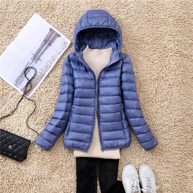 Women's travel-friendly puffer jacket. Lightweight, packable & insulated for all seasons.