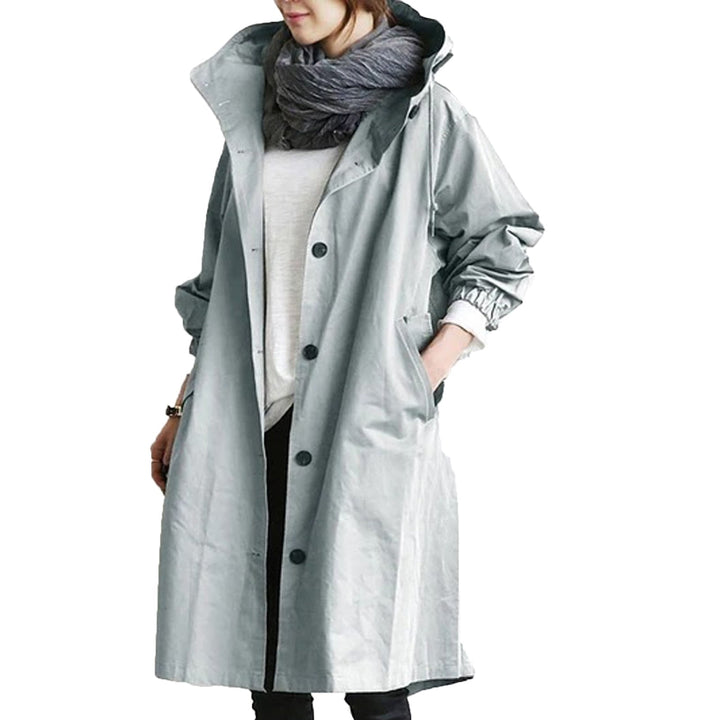 Trendy women's waterproof long coat, perfect as a spring/summer jacket for stylish rain gear and casual wear.