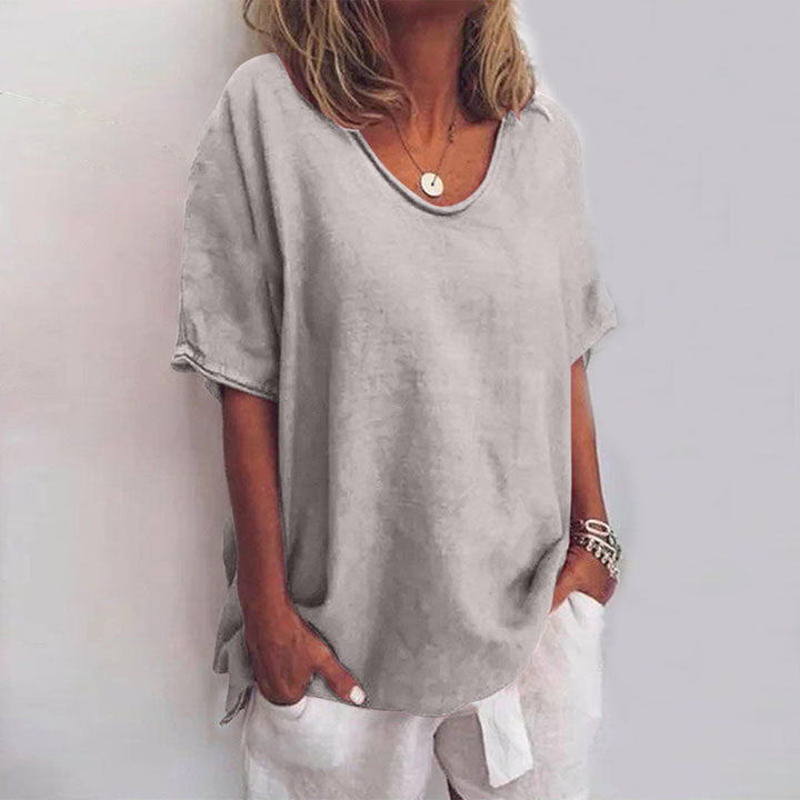 Versatile loose fit women's short sleeve t-shirt, ideal for comfortable summer wear & relaxed style.
