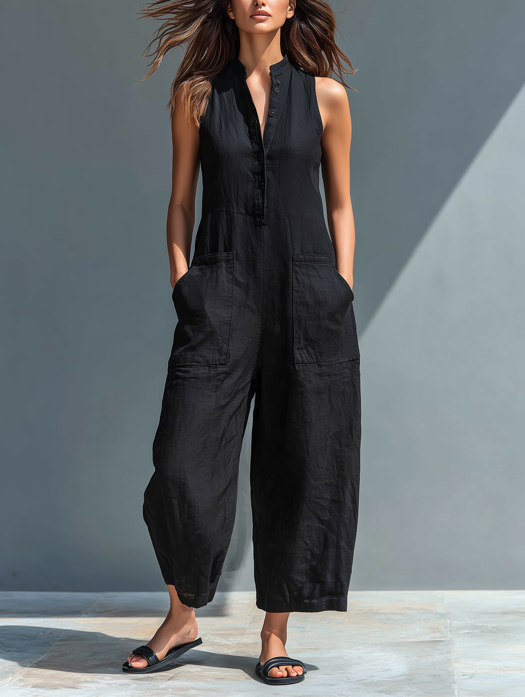 Women's loose sleeveless jumpsuit with stand collar & button-up front. Perfect for summer casual style.