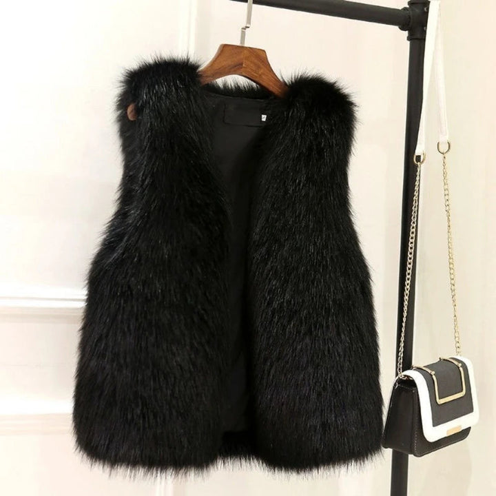 Chic women's winter vest. Soft, warm, and elegant sleeveless jacket for luxurious fall fashion outerwear.