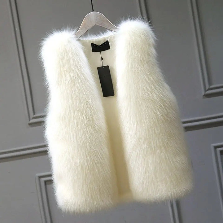 Fashionable women's winter vest. Luxurious & warm sleeveless outerwear for chic and cozy cold weather looks.