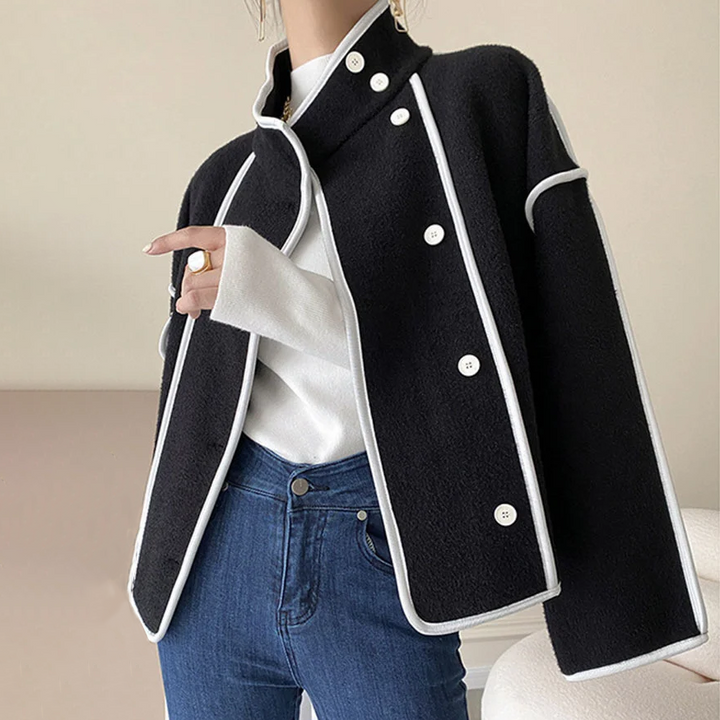 Sophisticated Women's Monaco jacket with elegant piping. Insulated fashion for stylish cold-weather looks.