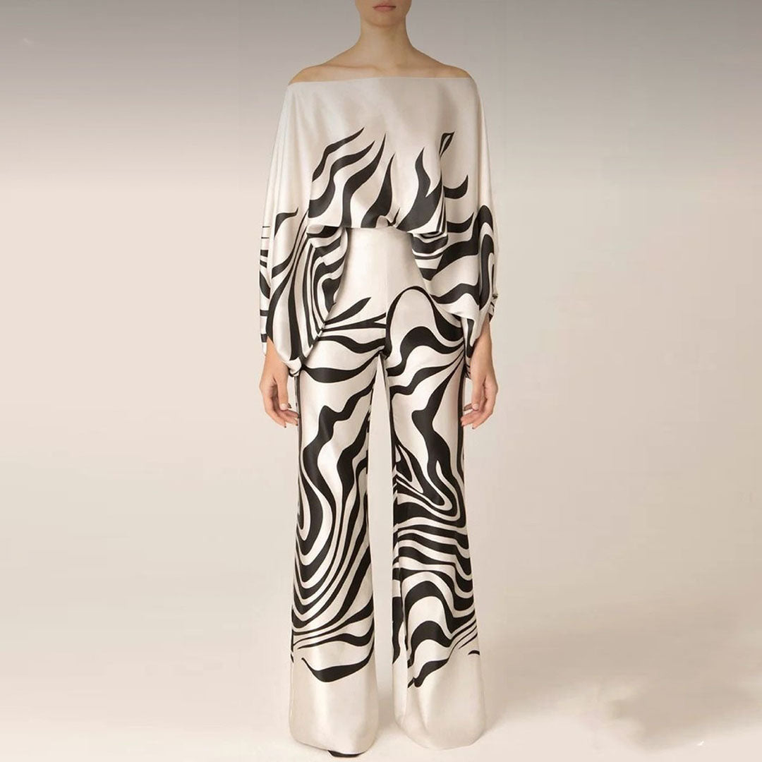 Fashionable women's off-shoulder printed two-piece set, a stylish option for summer casual wear.