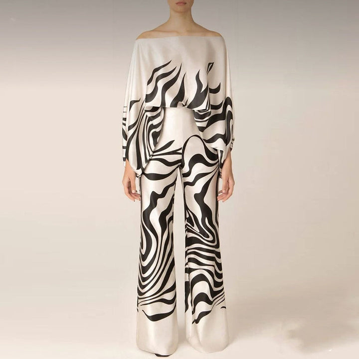 Fashionable women's off-shoulder printed two-piece set, a stylish option for summer casual wear.