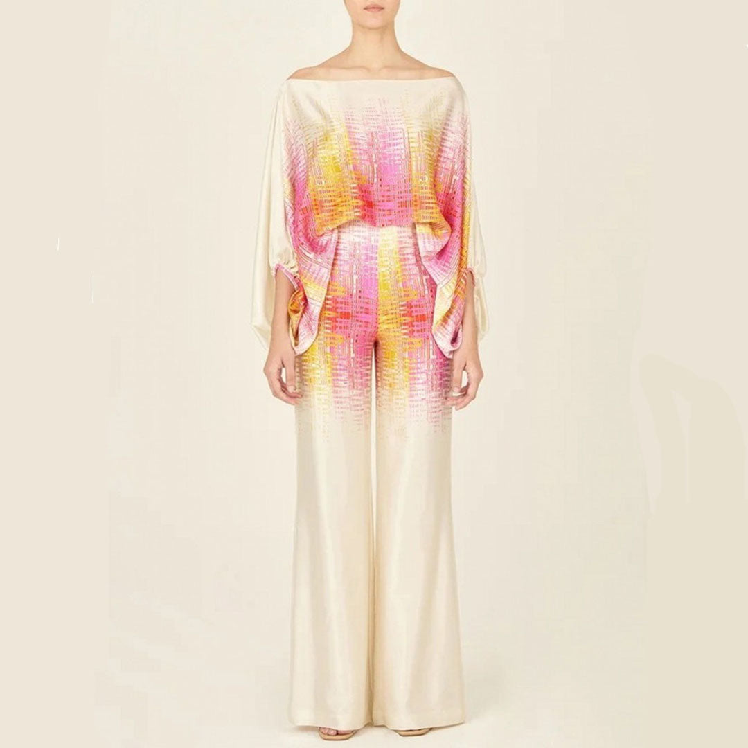 Elegant women's one-shoulder printed top and matching flowy wide-leg pants co-ord set, casual chic style.
