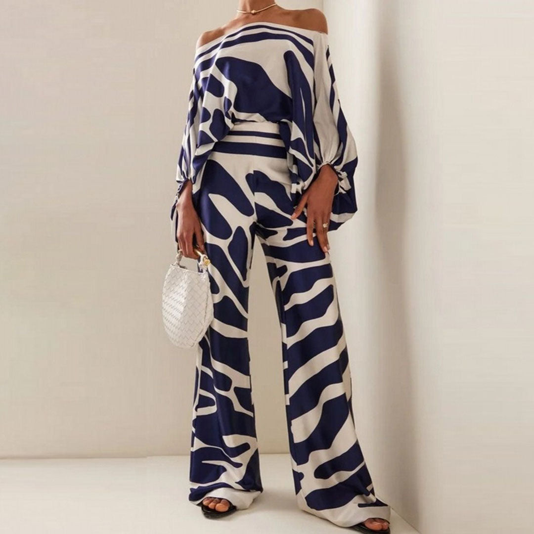 Women's one-shoulder printed co-ord set, including a stylish top and comfortable wide-leg pants.