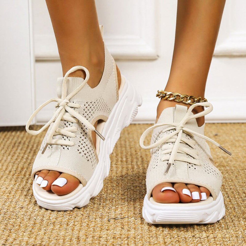 Stylish women's platform sandals with open toe, comfortable lace-up design for casual wear.