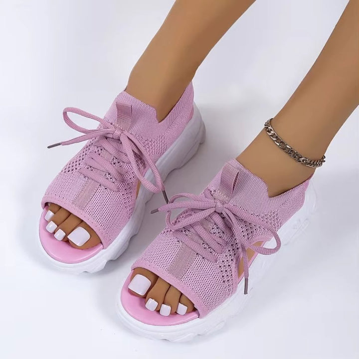 Stylish women's platform sandals with a chic open-toe & lace-up design for summer fashion.