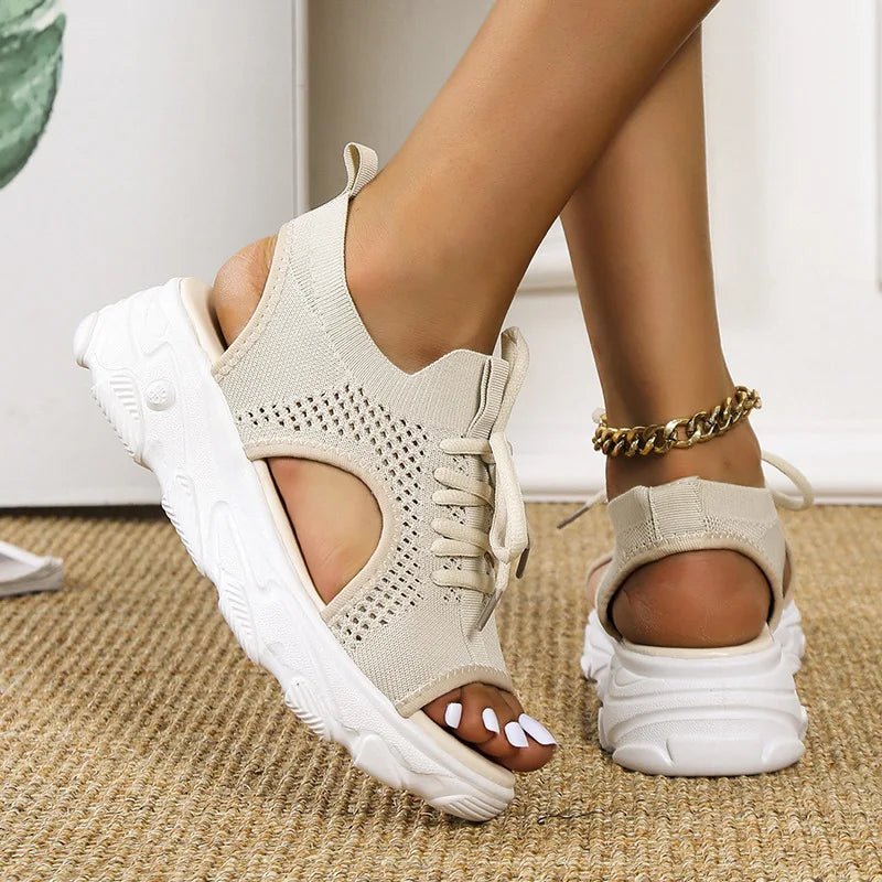 Fashionable open-toe platform sandals for women. Lace-up style, comfortable for summer casual wear.