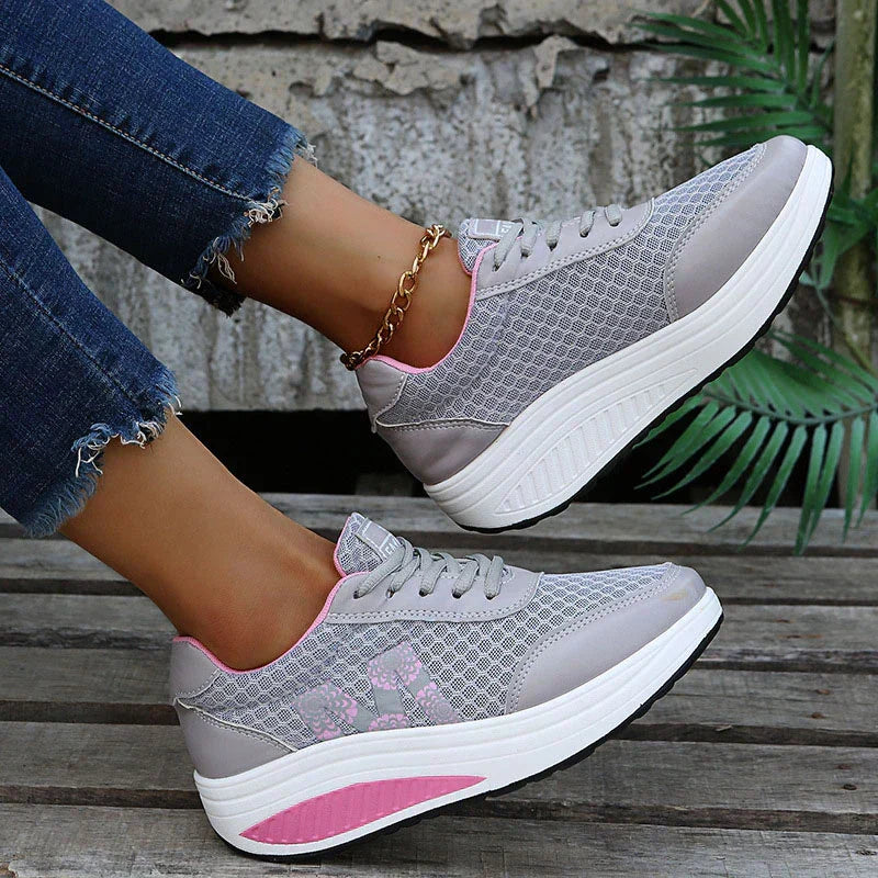 Breathable women's orthopedic sneakers for walking, featuring arch support & shock absorption.