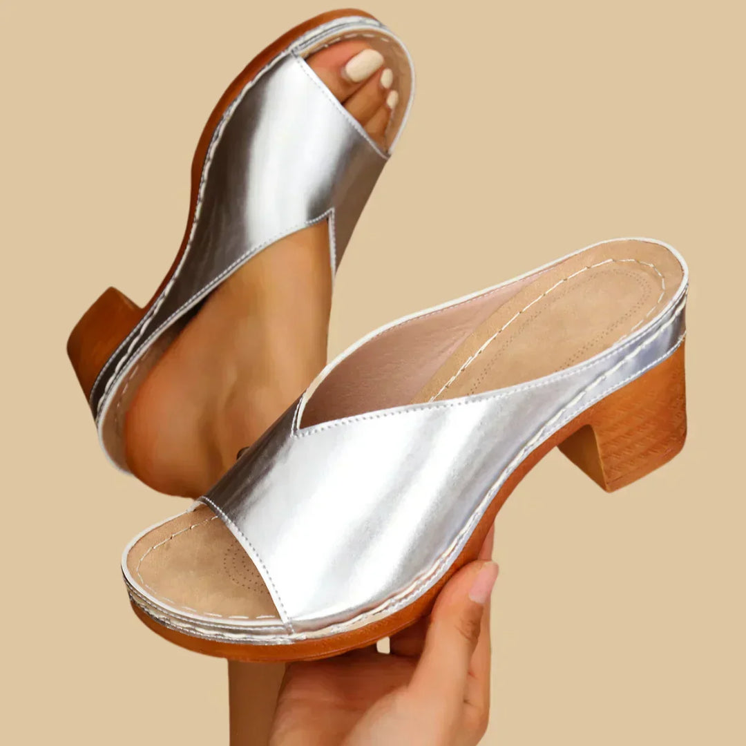 Supportive slip-on flat sandals for women, ideal for casual summer fashion.