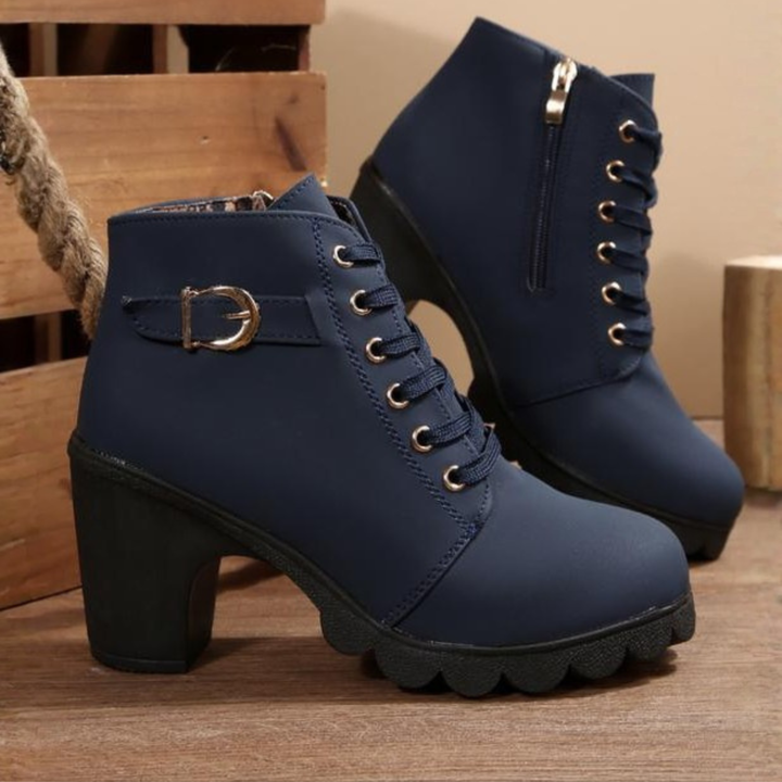 Close-up of women's comfortable orthopedic lace-up ankle boots, showcasing the block heel and durable design.