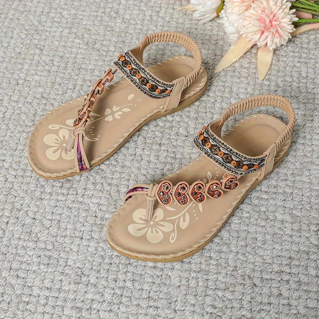 Close-up of women's orthopedic sandal showing contoured footbed, arch support, & adjustable hook-and-loop straps.