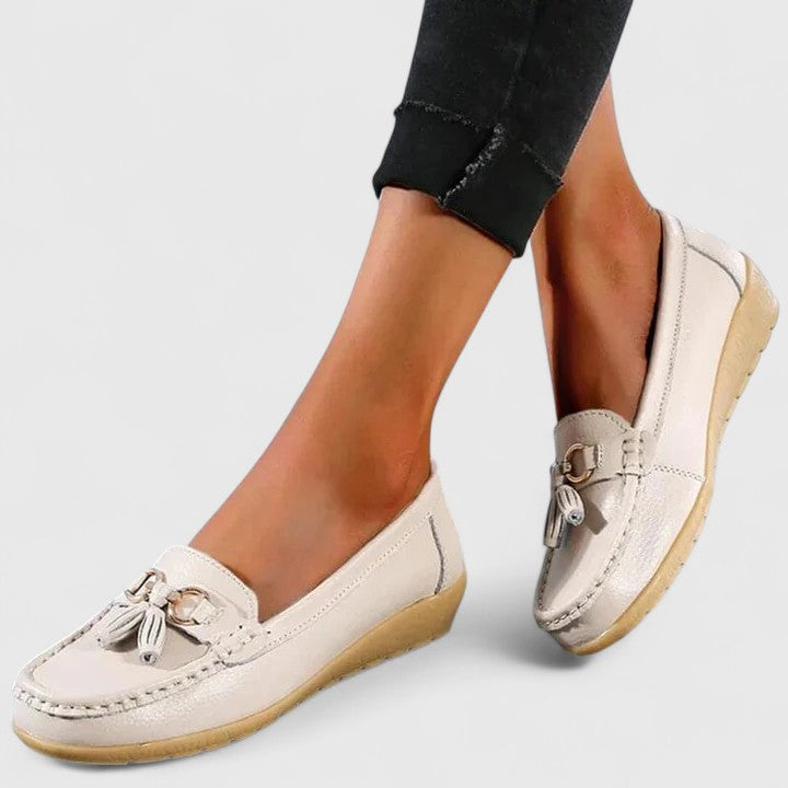 Durable women's orthopedic slip-on shoes, offering all-day cushioned comfort & support.