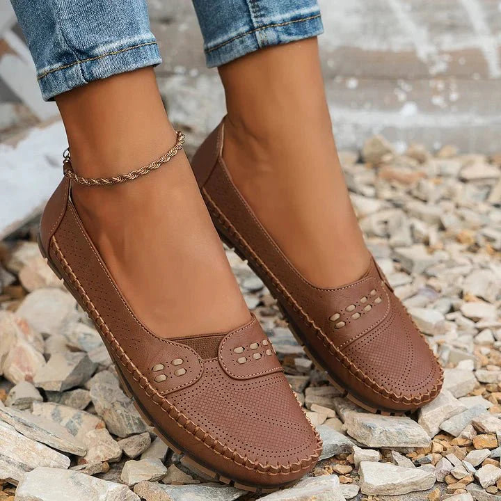 Everyday women's orthopedic shoes, comfortable slip-on loafers with a flat sole.