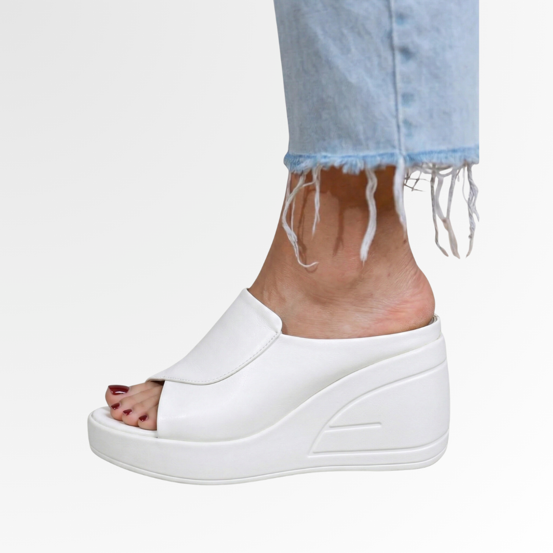 Comfortable women's orthopedic wedge sandals with a slip-on design, ideal for supportive summer footwear.