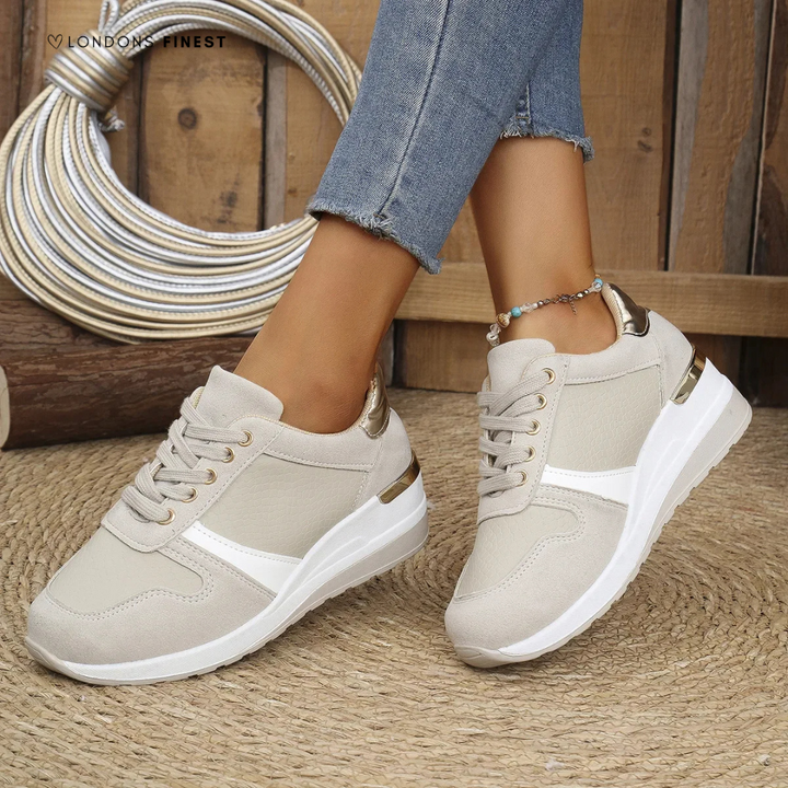 Women's orthopedic sneakers with arch support & cushioned sole for comfort & pain relief, ideal for walking.