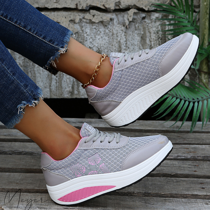 Supportive women's athletic casual sneakers. Comfort footwear for everyday wear, walking, & active support.