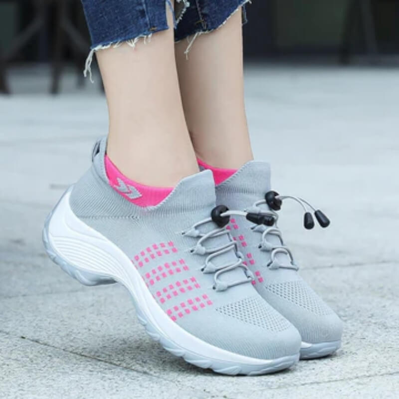 Stylish women's walking shoes with orthopedic features for improved mobility & foot health.
