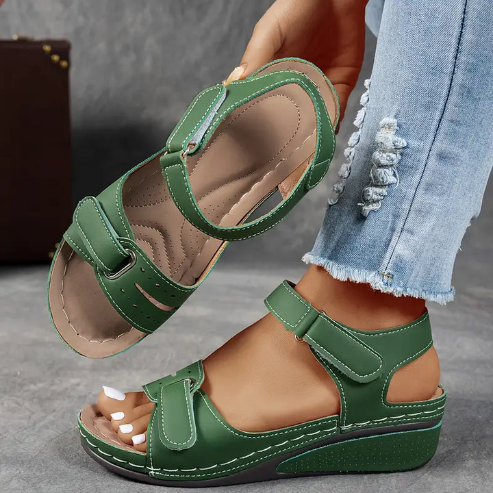 Comfortable women's wedge sandals offering excellent arch and foot support for all-day walking.