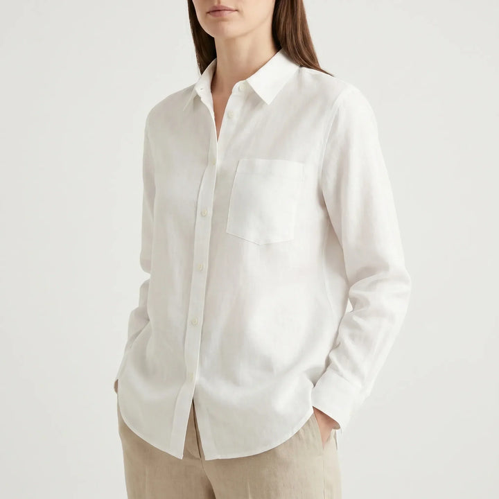 Versatile women's oversized button-down. Lightweight, long sleeve shirt for chic, effortless summer style.