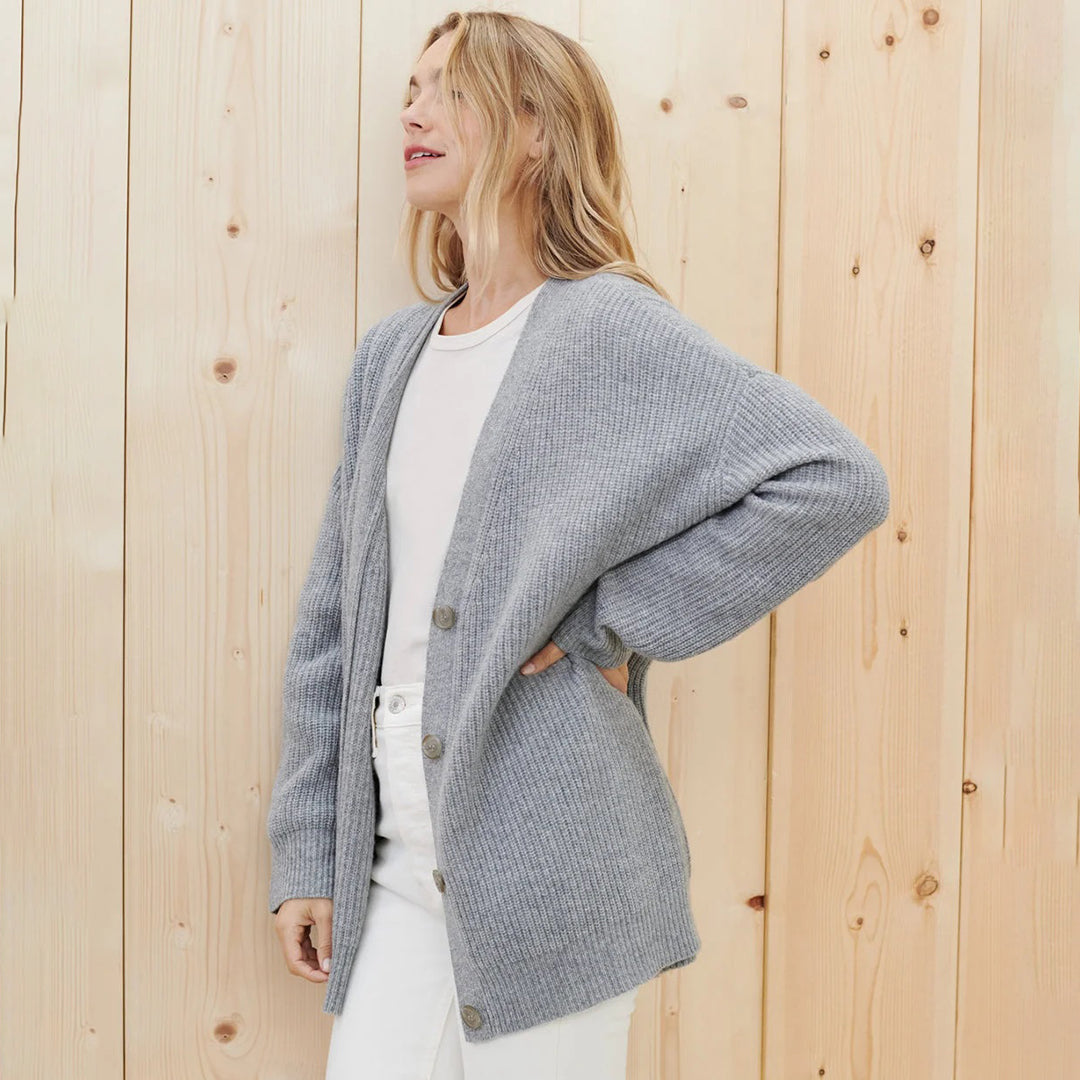 Relaxed fit women's oversized button-up cardigan, soft & comfortable for versatile layering.