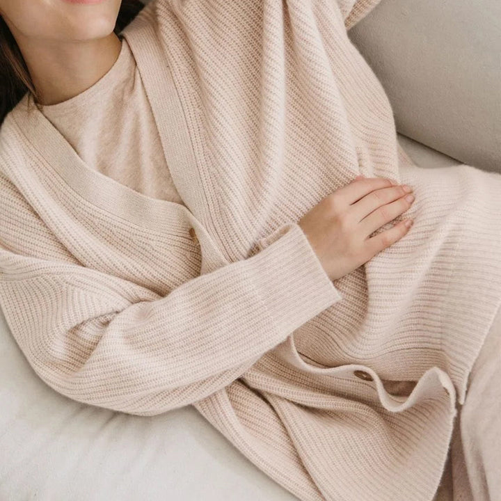 Women's oversized button-up cardigan styled for everyday comfort, a perfect layering piece.