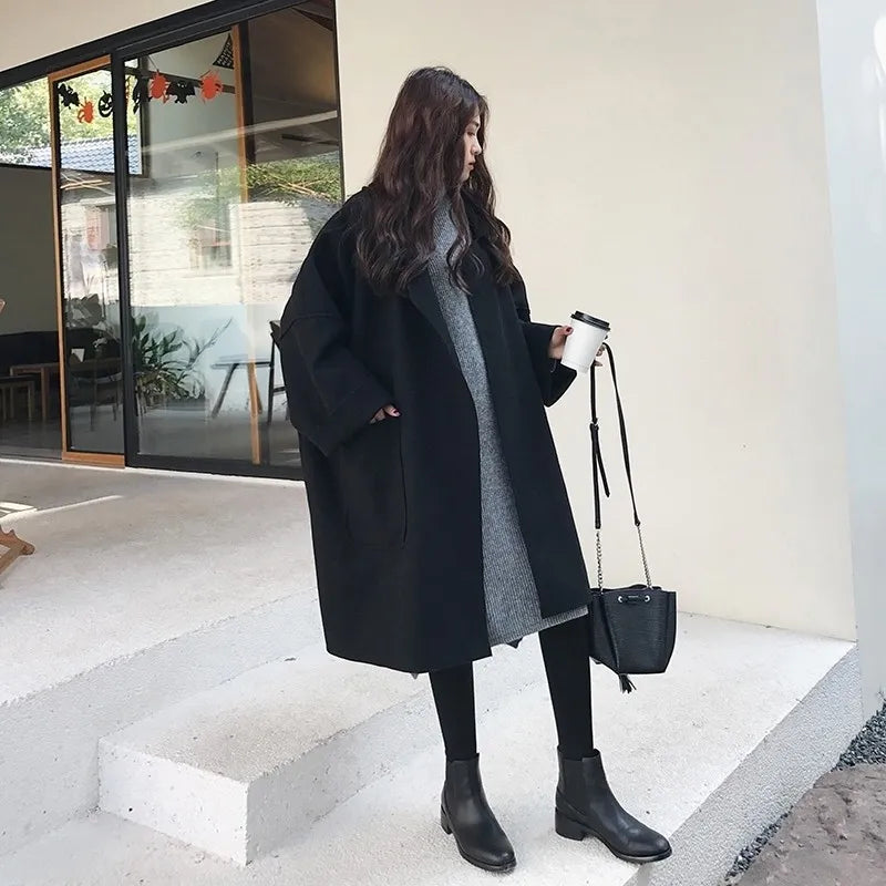 Women's elegant oversized trench coat, a classic business casual long coat for fall.