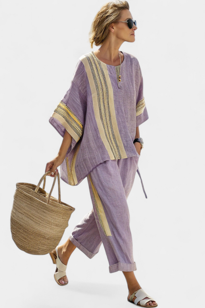 Stylish women's resort wear two-piece set, oversized, with intricate embroidery & stripe trim.