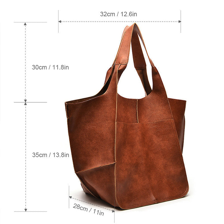 Elegant oversized shoulder bag for women, made of rich, supple vintage leather.
